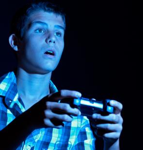 Boy playing computer game