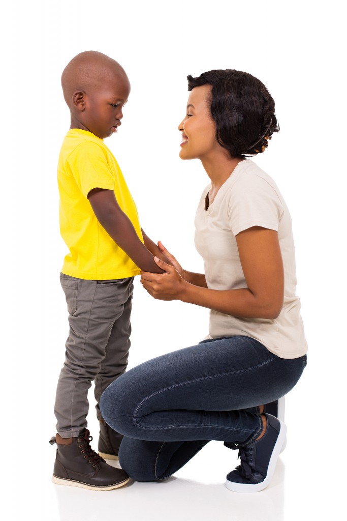 beautiful african woman talking to her son on white background